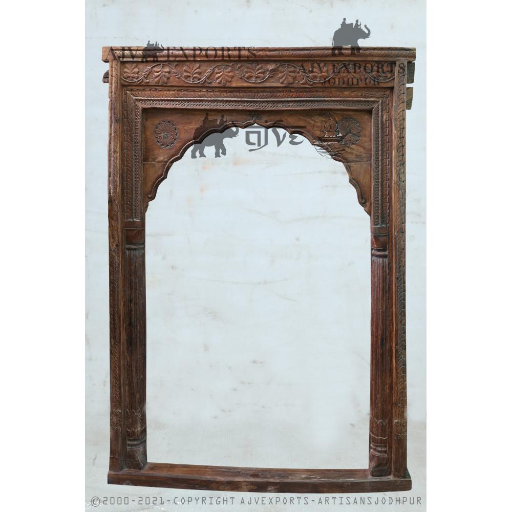 Ornate wooden archway with detailed carvings
