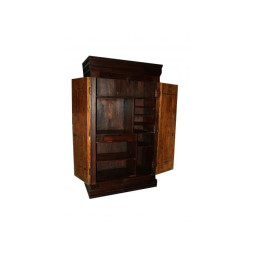Wooden hand-carved old door cupboard with storage shelves inside